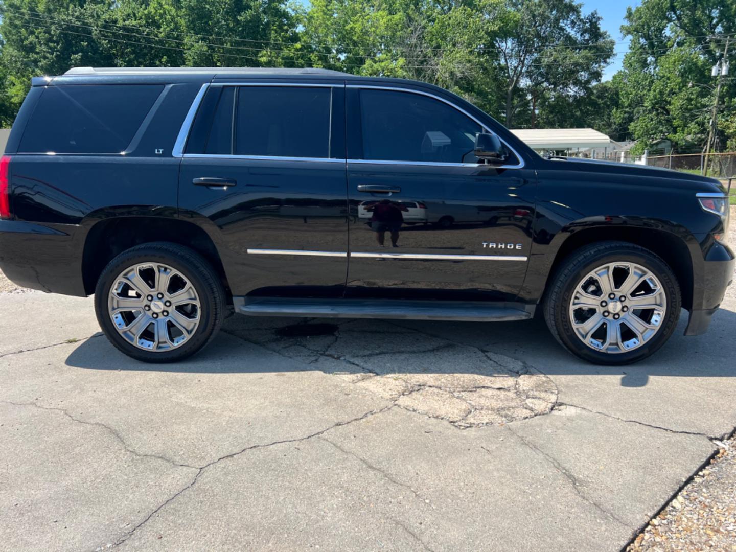 2015 Black /Black Chevrolet Tahoe LT (1GNSCBKC4FR) with an 5.3 V8 engine, Automatic transmission, located at 4520 Airline Hwy, Baton Rouge, LA, 70805, (225) 357-1497, 30.509325, -91.145432 - 2015 Chevy Tahoe LT No Accidents 5.3 V8 Gas, 136K Miles, Heated Leather Seats, 8 Passenger Seating, DVD, Backup Camera, Power Windows, Locks & Mirrors, Cold A/C, Bose, Power Liftgate. FOR INFO PLEASE CONTACT JEFF AT 225 357-1497 CHECK OUT OUR A+ RATING WITH THE BETTER BUSINESS BUREAU WE HAVE BE - Photo#4